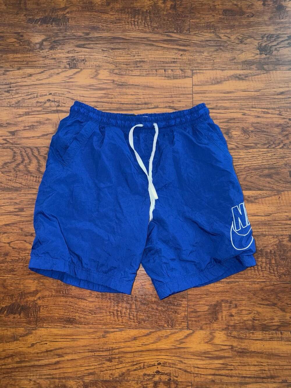 Vintage Nike Blue Nylon Athletic Shorts with Big Swoosh Spellout Logo